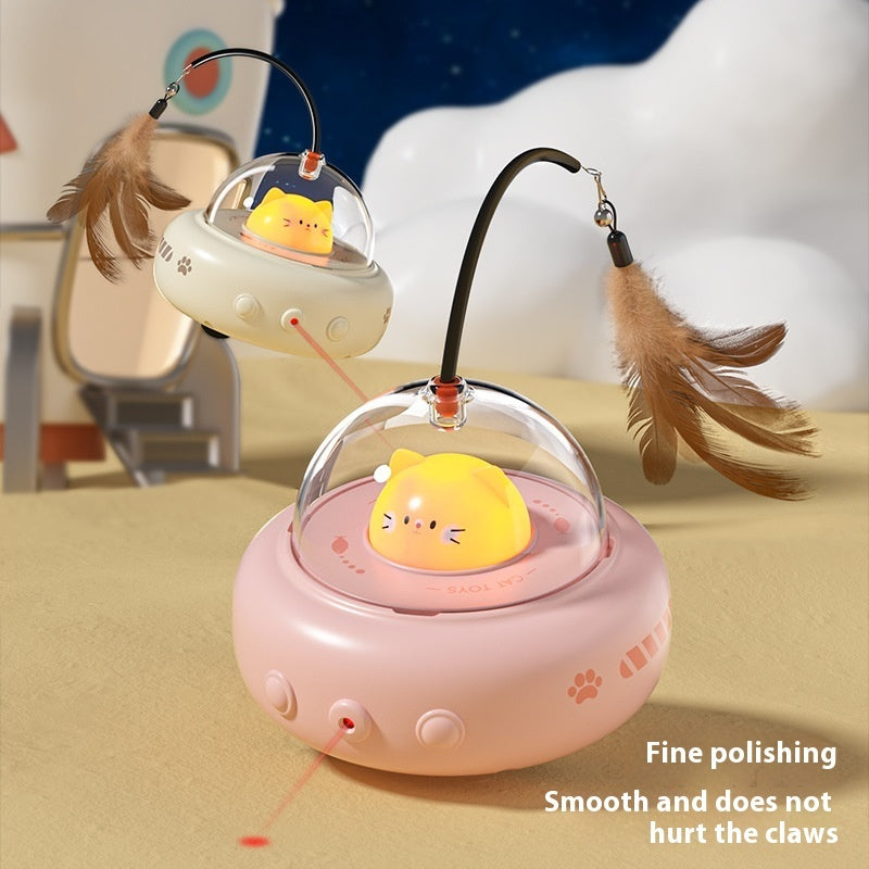 Toy with a transparent dome and feather attachments on a beige surface