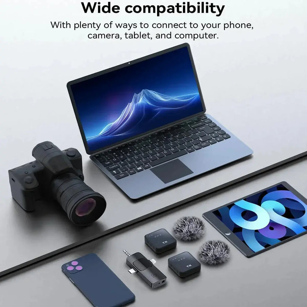 A professional setup featuring a laptop, tablet, camera, and smartphone, showing the 3-in-1 wireless microphone receiver and two transmitters, highlighting wide compatibility for various devices.