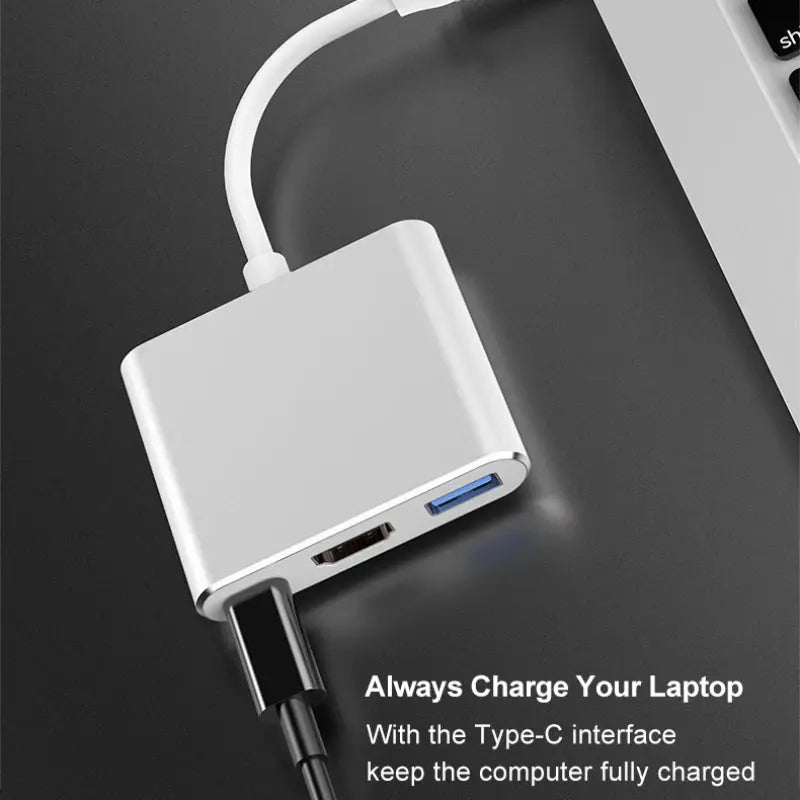 Type-C adapter with USB ports on a dark surface