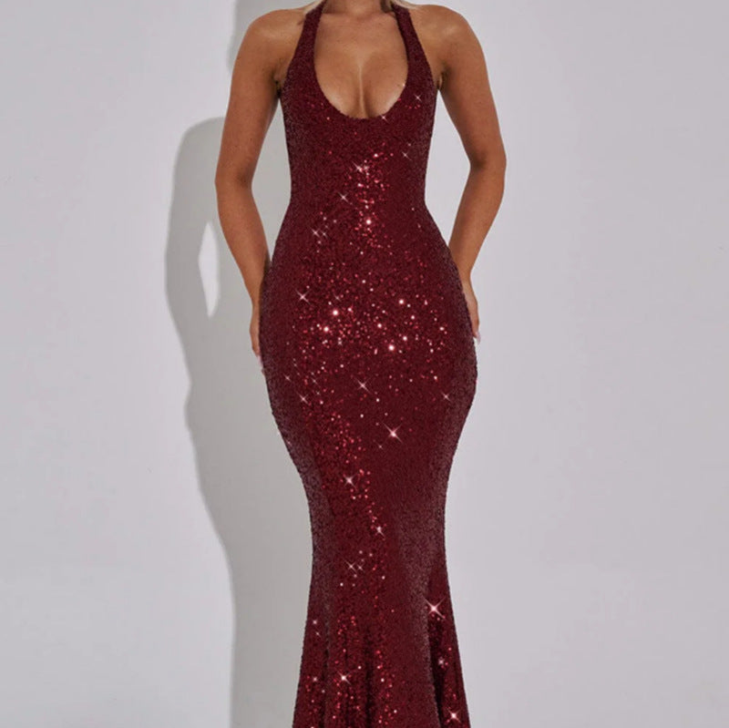 Red sequin dress on a plain background