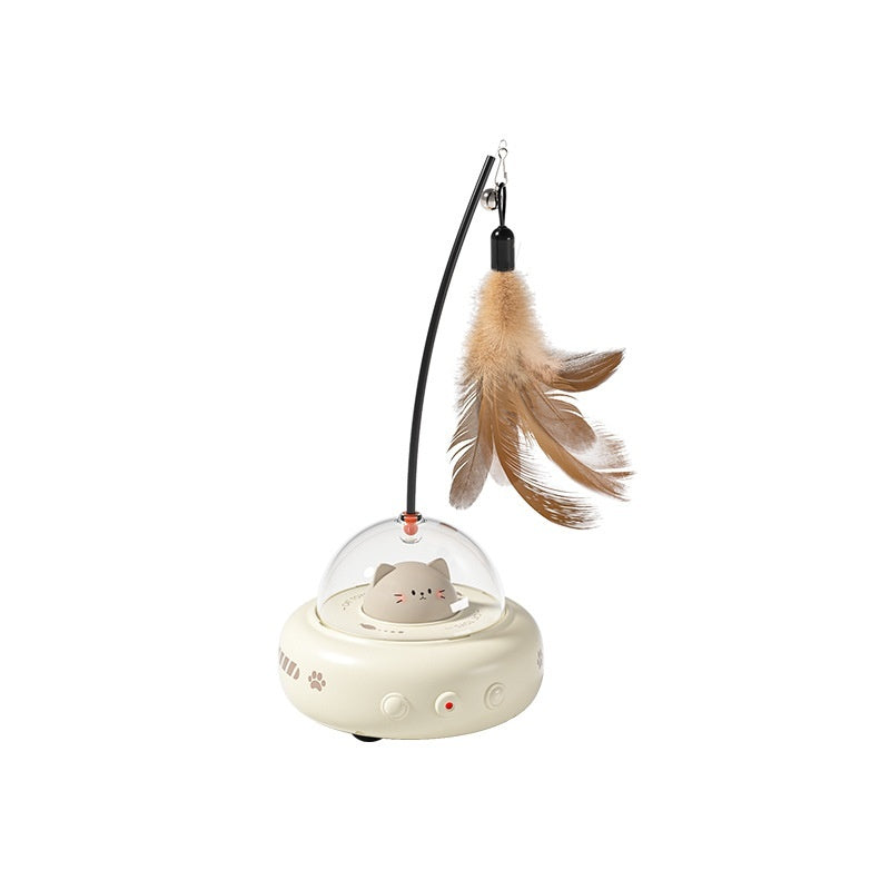 Cat toy with a feather and transparent dome on a white background