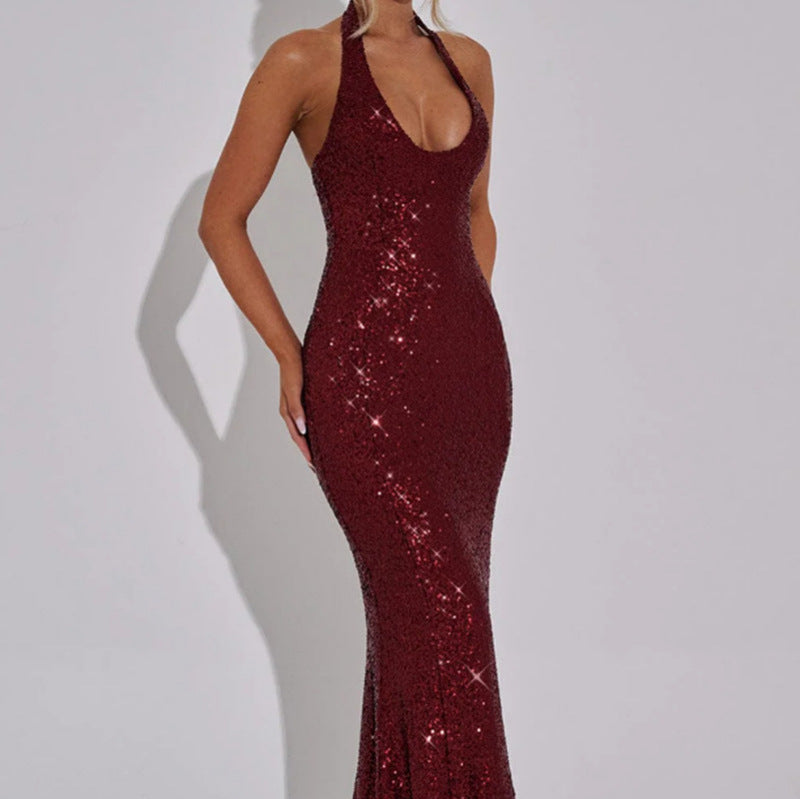 Red sequin dress on a plain background