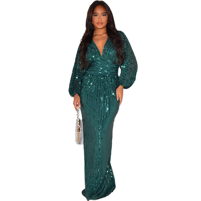 Woman wearing a green sequin dress on a white background