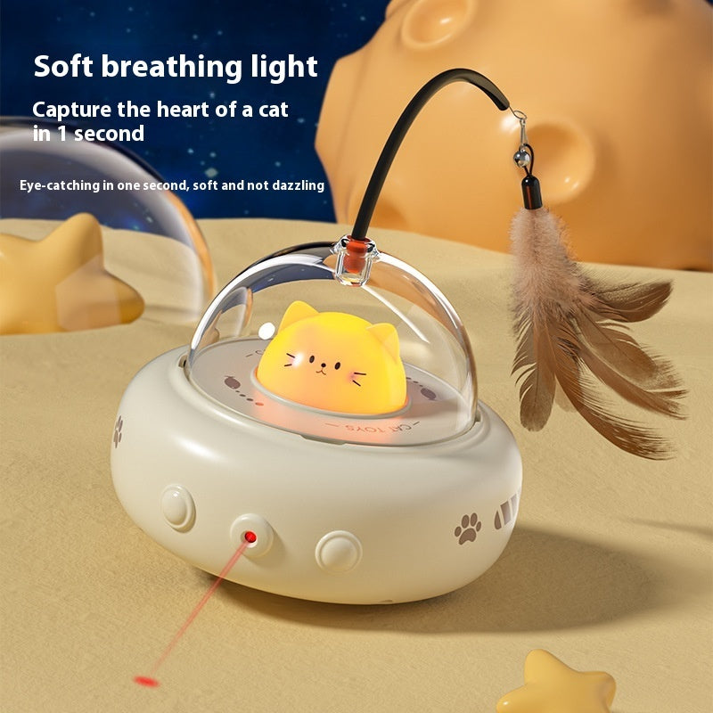 Cat-shaped soft breathing light with feather toy on a beige surface