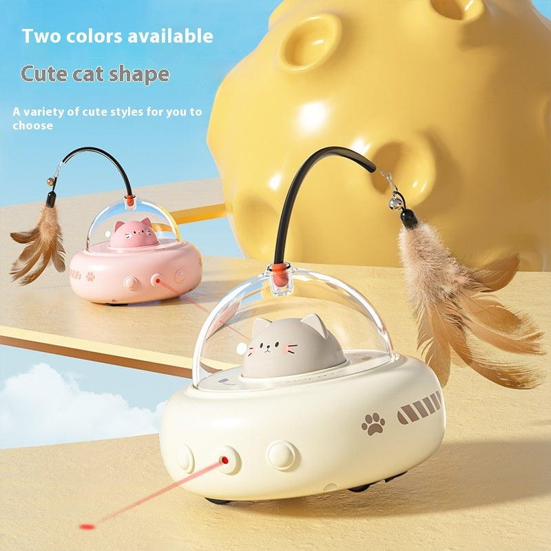 Cat-shaped toy with feather attachments on a wooden surface with a blue sky background.
