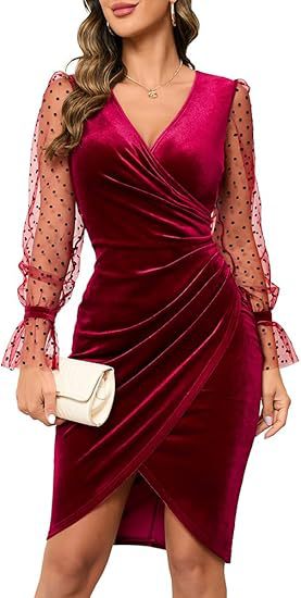 Woman wearing a burgundy velvet dress with sheer sleeves on a white background
