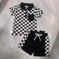 boys-black-checkered-lapel-shorts-suit-flat-lay
