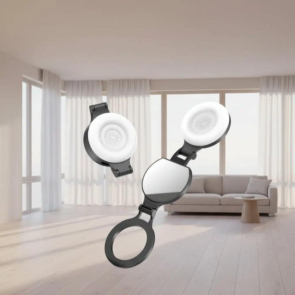 A MagSafe magnetic selfie light and double-sided mirror set featuring a black foldable stand, shown both collapsed and extended on a light blue background, highlighting its dual-functionality for content creation.
