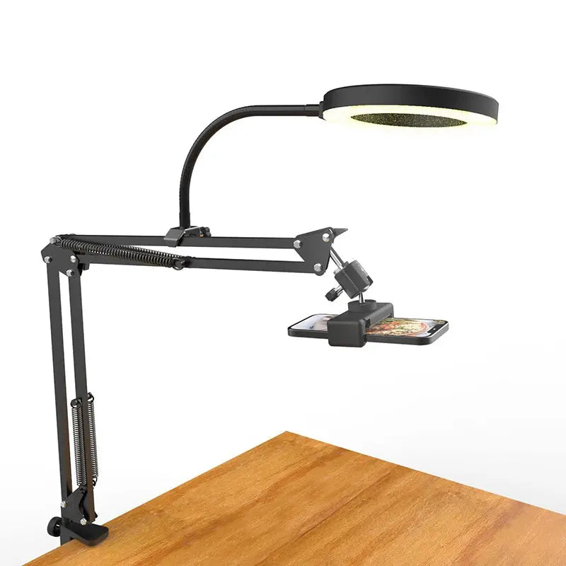 FlexiGo LED lamp with adjustable arm on a wooden surface
