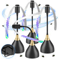 Three black and gold insect traps with LED lights on a white background