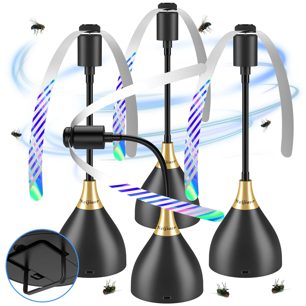Three black and gold insect traps with LED lights on a white background