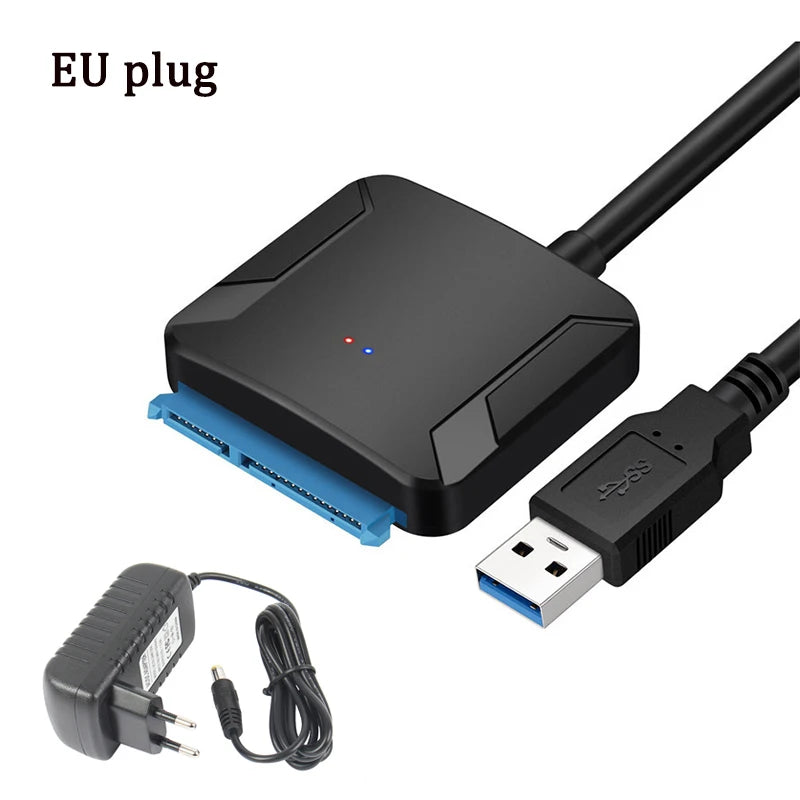 Computer hardware components including a black adapter, blue cable, USB cable, and power adapter on a white background.