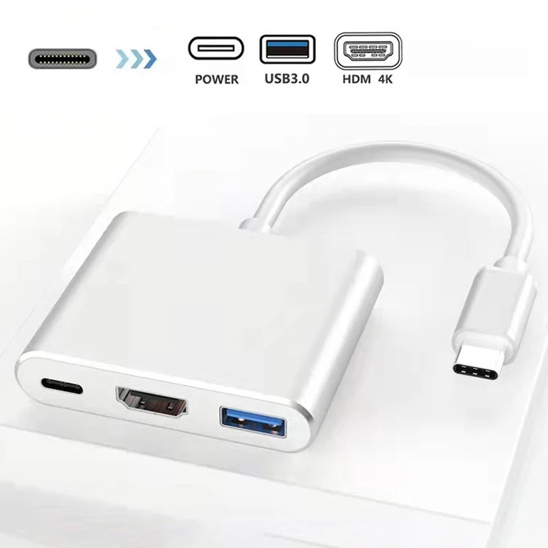 Multifunctional adapter with USB-C connector on a white background