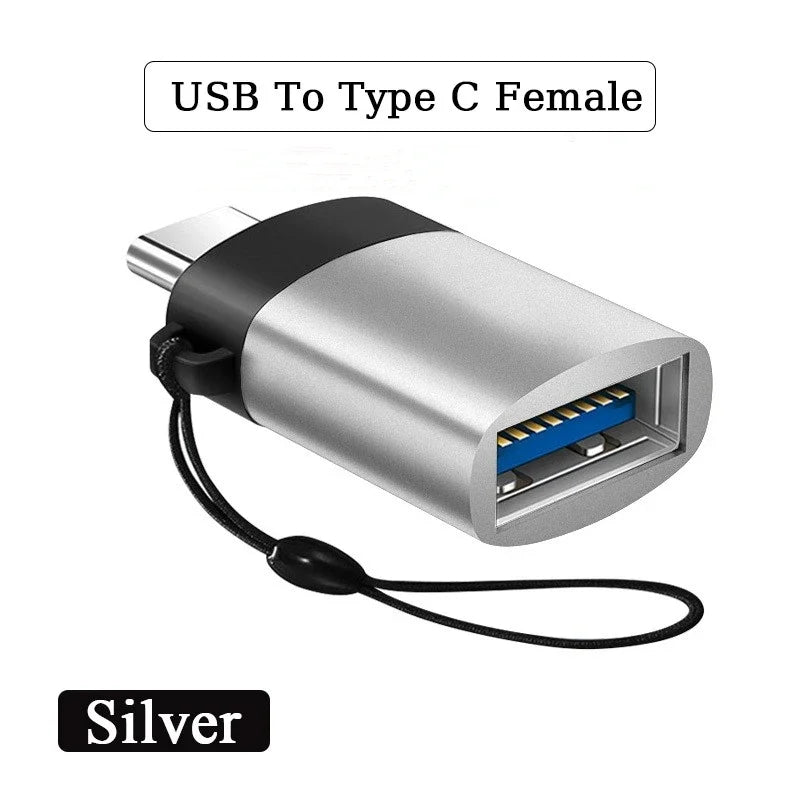 Silver USB to Type C female adapter on a white background