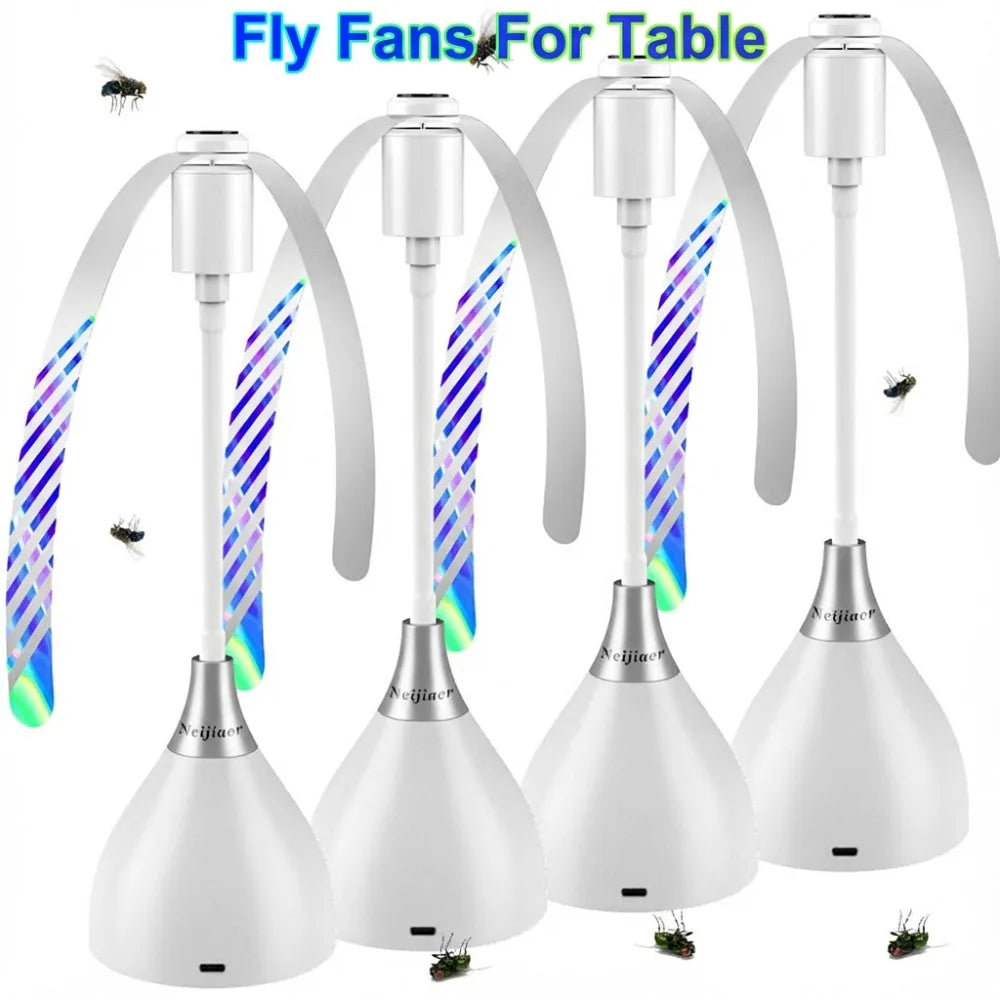Fly fans for table with colorful light effects on a white background