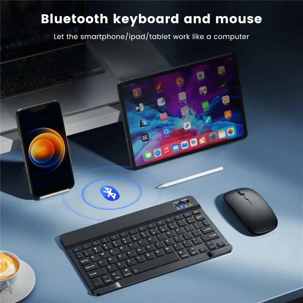 Bluetooth keyboard and mouse setup on a desk with smartphone, tablet, and coffee.