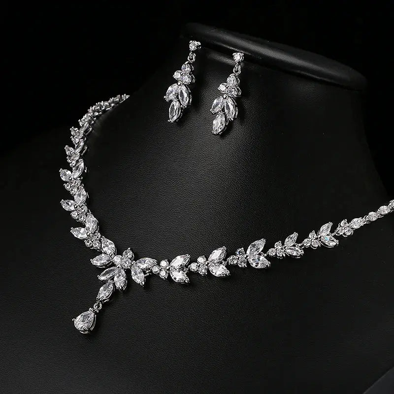 Detailed close-up of the cubic zirconia bridal necklace, highlighting the marquise-cut stone clusters and elegant teardrop pendant.