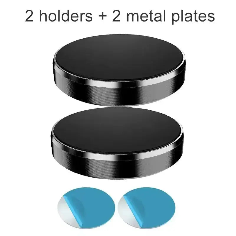 Two black metal plates with two blue circular objects on a white background