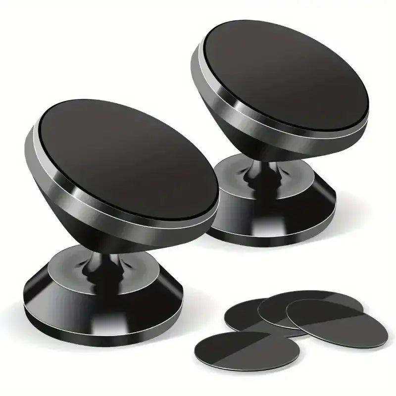 Two sleek, black magnetic car phone holders displayed with metal adhesive plates on a clean white background.