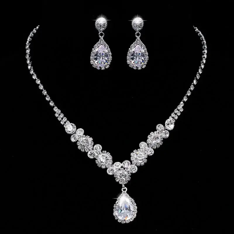 Flat-lay image showcasing the moissanite jewelry set with options for Rhodium, Rose Gold, and Yellow Gold finishes.