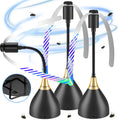 Three black insect traps with colorful lights and a power adapter on a white background.