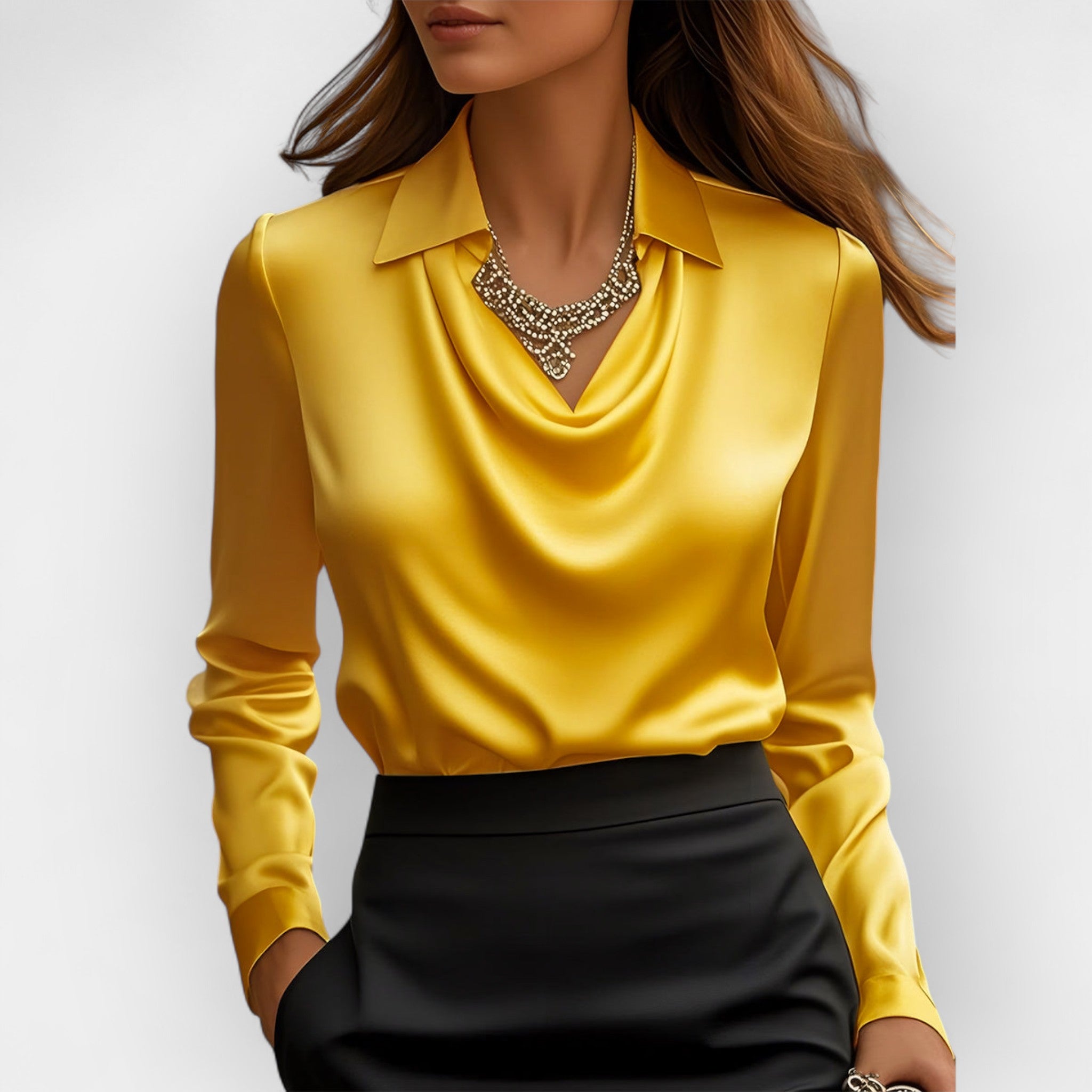 Front view of a woman wearing a bright yellow satin long-sleeve top